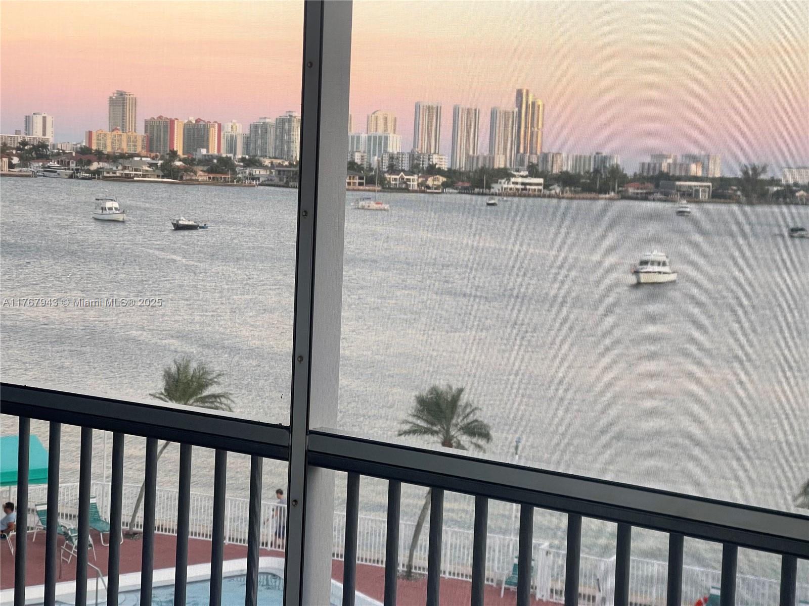 In the heart of Aventura, 2 bedroom 2 bath WATER VIEW THROUGHOUT the unit. Wrap-around screened patio with Split bedroom layout for optimal privacy and both bedrooms with Spacious walk-in closets and ample storage. Accordion hurricane shutters. NEW WINDOWS IN kitchen & bathrooms. Furnished As IS. No new assessments for now. Reserves FUND is included in low maintenance. Total of 5 pools- sauna & gym, Card room, library, party room, plenty of billiard tables, ping pong, 2.5 miles of scenic walking paths, 24/7 secured, gated community. Take advantage of convenient access within walking distance to shopping, restaurants, and Aventura Mall. Stay active with twice-weekly FREE YOGA, TAICHI, ZUMBA, PAINTING, Friday night dance, or Shows in the Auditorium, ON LOCKBOX ,Active 55+ Community
