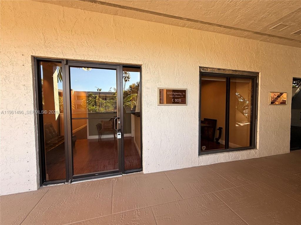 Photo of 2699 Stirling Rd #C202, Hollywood, FL 33312 (MLS # A11961496)