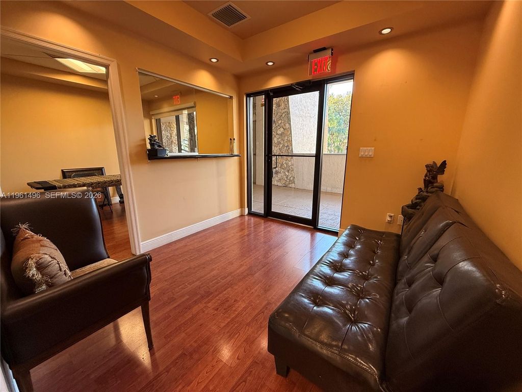 Photo of 2699 Stirling Rd #C202, Hollywood, FL 33312 (MLS # A11961496)