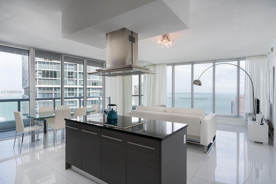 Spectacular 2-beds, 2-baths residence on the 41st floor of Icon Brickell with sweeping views of Biscayne Bay, the Miami River, and the city skyline. Spacious open layout with floor-to-ceiling glass, private balcony, and a fully equipped modern kitchen. Bedrooms offer generous closets and spa-style baths. Enjoy Icon Brickell’s world-class amenities: infinity pool, spa, fitness center, on-site dining, and concierge. Short-term rentals permitted, making this an ideal home or investment. Located in the Heart of Brickell.
