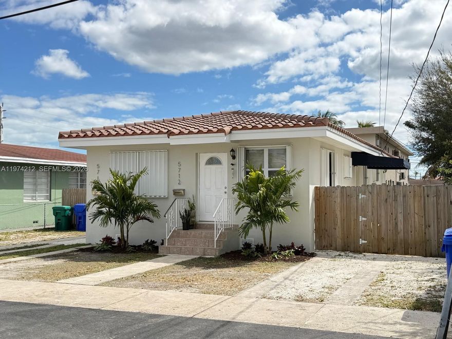 Premium Duplex in Prime Location – Fully Legal. Well-maintained and renovated duplex in a highly desirable area. Features a newer tile roof and accordion shutters throughout. The front unit offers 2 bedrooms and 1 bathroom, while the rear unit includes 1 bedroom and 1 bathroom. Property is fully fenced with a private backyard and ample front parking. Both units are currently rented on a month-to-month basis, providing immediate income with flexibility for future use. On-site laundry adds tenant convenience. Septic system in place. Drive-by only. Do not disturb tenants. Interior access granted with accepted offer only. Ideal opportunity for investors or owner-users seeking income in a premium location.