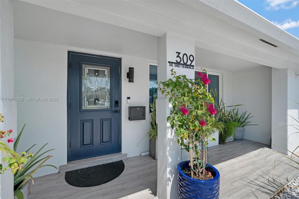 Photo of 309 SE 3rd Ter, Deerfield Beach, FL 33441 (MLS # A11975582)