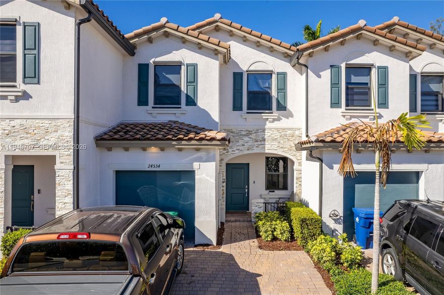 Located in Homestead, this 3-bedroom, 2 1/2-bath townhouse offers great value and an easy lifestyle close to parks and shopping. The open layout connects the living room, dining area, and kitchen—perfect for everyday living and entertaining. Ceramic tile flooring throughout the first floor gives the home a clean, modern look, while the second floor is carpeted for comfort. Step outside to a spacious backyard with cement flooring, ideal for relaxing or hosting get-togethers, plus a rear gate for added convenience.