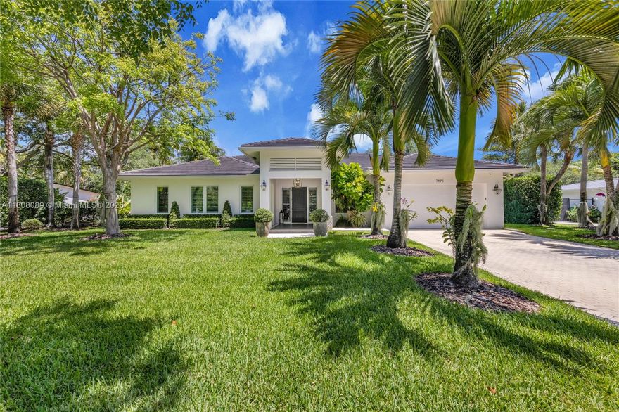 Custom built in 2017, this gorgeous, 5 BR, 4 BA home measures 3,903 SF and features high-end, modern finishes throughout! The open-concept floorplan is perfect for modern entertaining & living. Enter from the covered front porch to find living and dining areas that flow seamlessly into the open kitchen with gas range, stainless steel appliances, island with eat-in area, & walk-in pantry.  Hurricane impact glass sliding doors lead to a deep covered patio w/ full summer kitchen overlooking a heated saline pool & turf lawn surrounded by tall privacy hedges.  The primary suite enjoys 2 walk-in closets, & spacious bathroom w/ dual sinks & large walk-in shower. 4 add’l BRs share 3 BAs, there is a generous laundry room, 2 car garage, full house generator, & much more in the heart of Pinecrest!