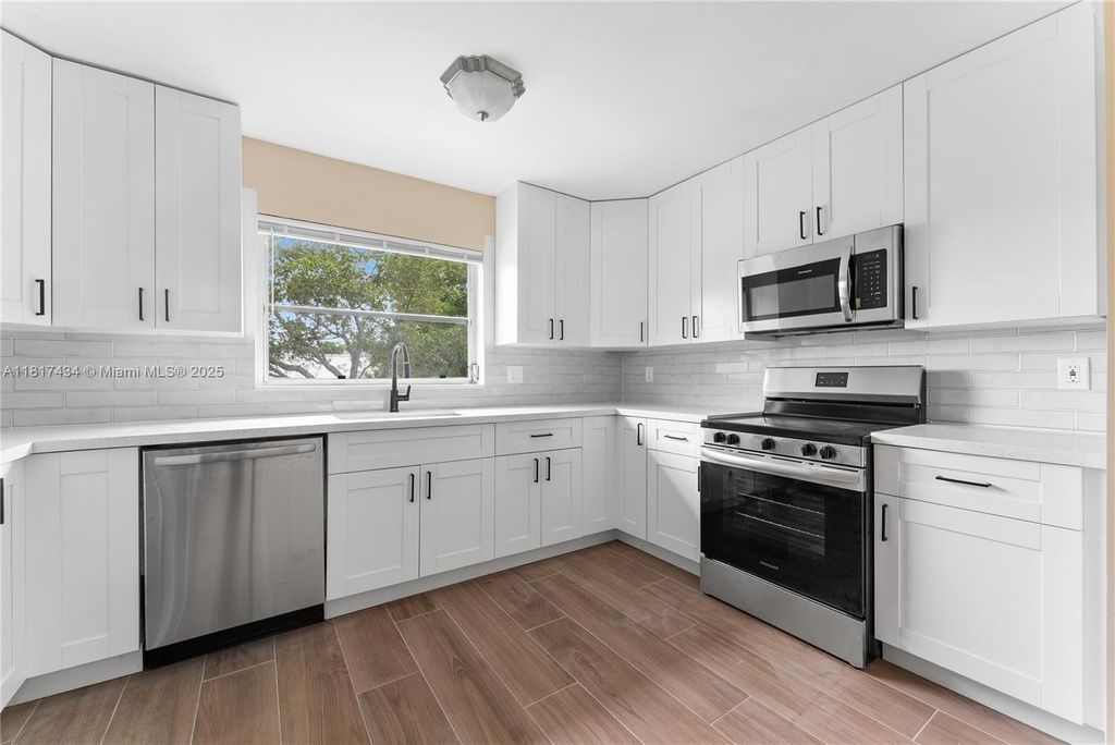 Photo of 10221 NW 35th St #7, Coral Springs, FL 33065 (MLS # A11817434)