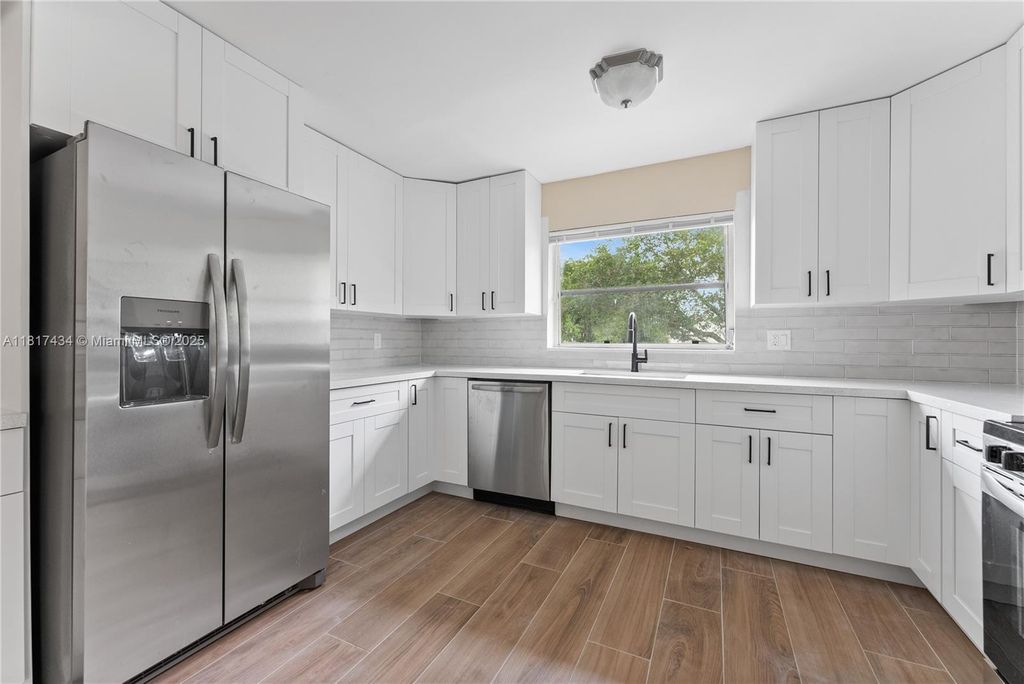 Photo of 10221 NW 35th St #7, Coral Springs, FL 33065 (MLS # A11817434)
