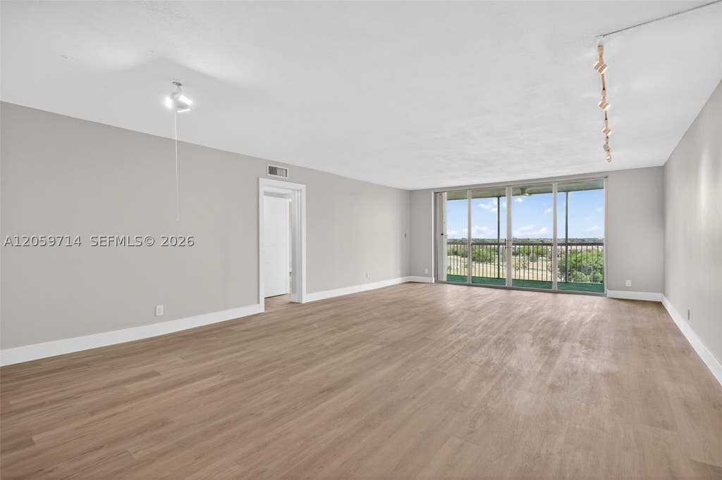 Photo of 3090 N Course Dr #807, Pompano Beach, FL 33069 (MLS # A12059714)