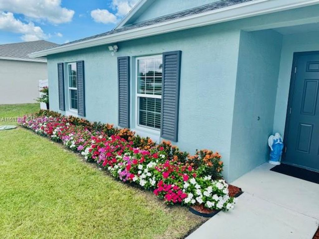 Photo of 4612 SW Paley Rd, Port Saint Lucie, FL 34953 (MLS # A11611399)