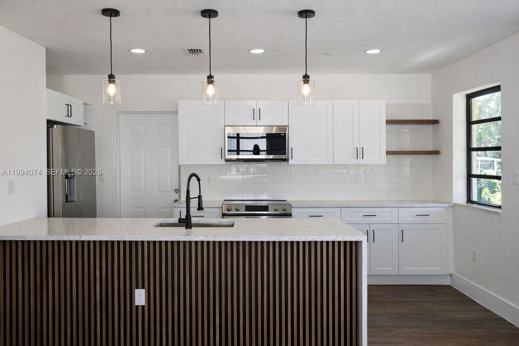 Photo of 1950 NW 57th St #1950, Miami, FL 33142 (MLS # A11994074)