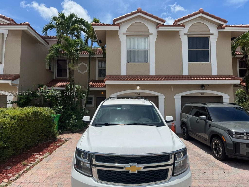 Photo of 9064 NW 54th St #9064, Sunrise, FL 33351 (MLS # A12049592)