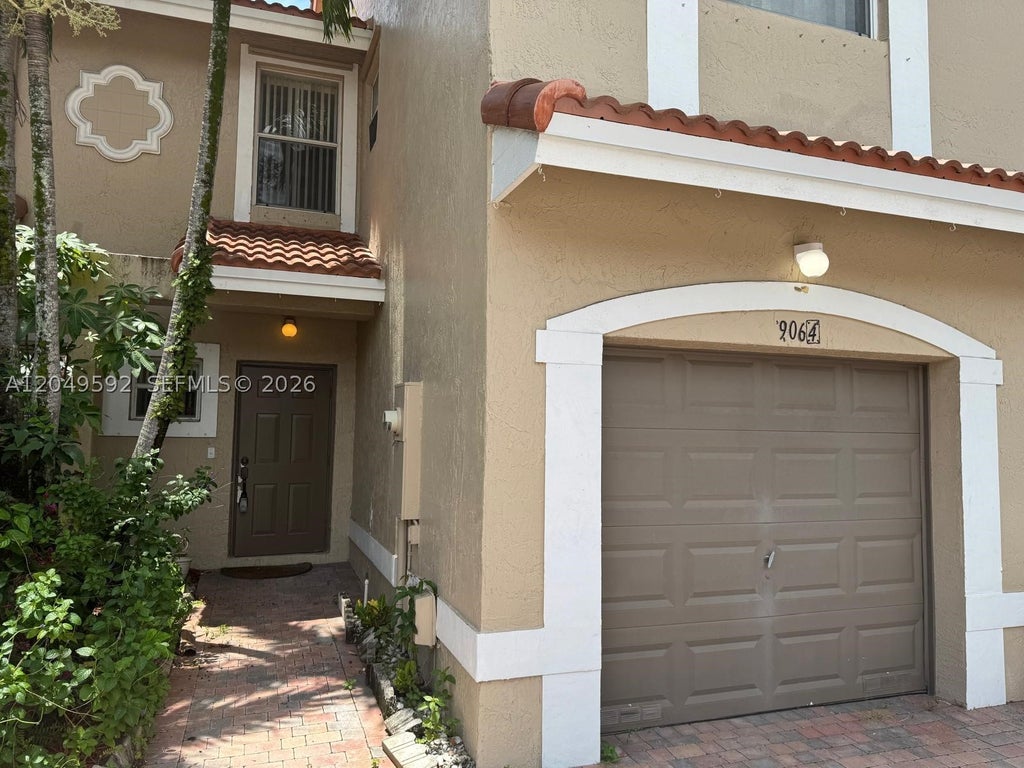 Photo of 9064 NW 54th St #9064, Sunrise, FL 33351 (MLS # A12049592)