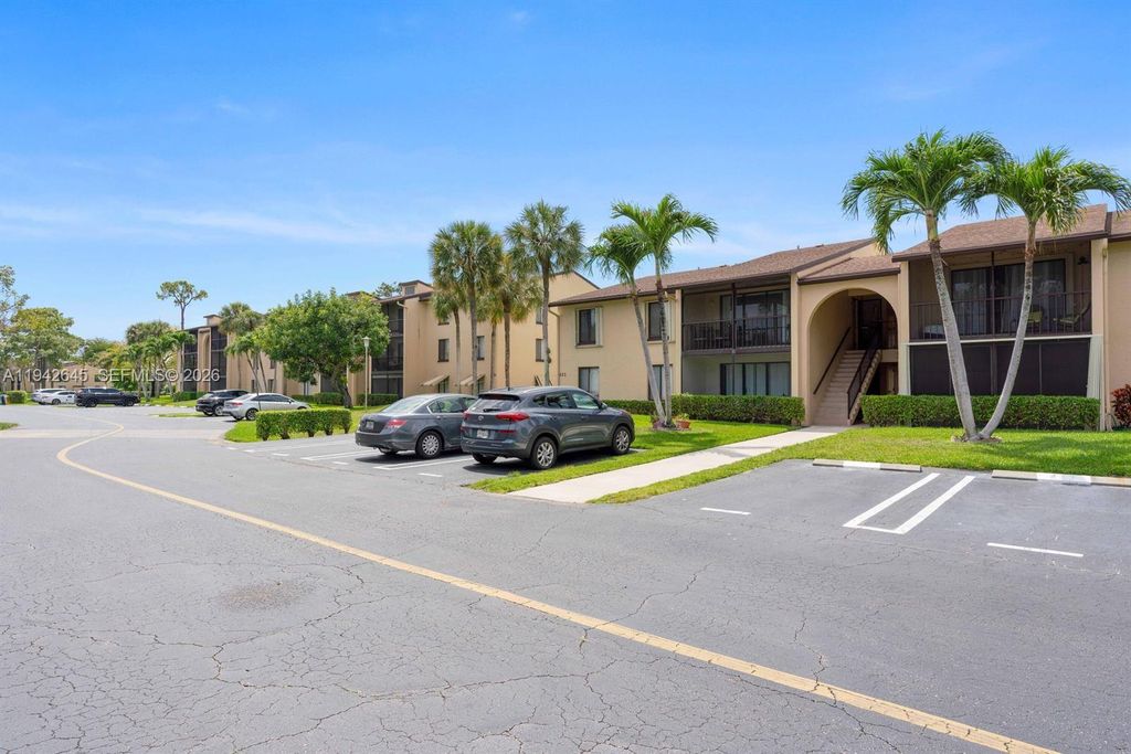 Photo of 623 Sea Pine Way #C1, Green Acres, FL 33415 (MLS # A11942645)