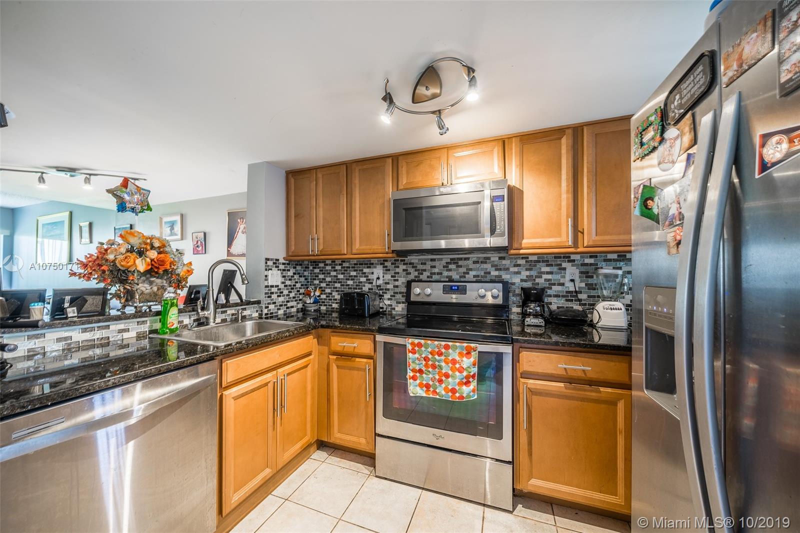 Great property for a starter or an investment, this beautiful well-designed townhouse of two bedrooms one and a half bathroom features tile throughout the unit, upgraded kitchen, SS appliances, only two years A/C unit, washer & dryer hook up. Walk-in closet in master, wall to wall closet in the second room, half bathroom on the first floor. Gated community with security access and a community pool. Centrally located, close to Downtown Miami, Near shopping centers, expressways, schools and minutes from Miami International Airport, assigned parking in front of the unit, by appointment only. Priced to sell fast...