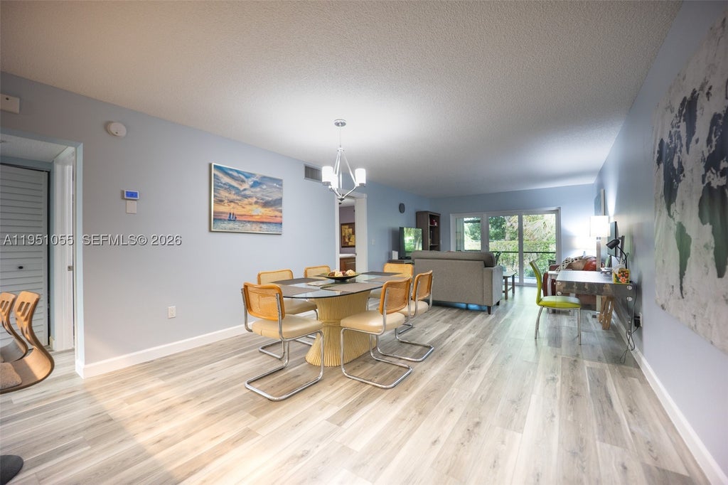 Photo of 4000 Crystal Lake Dr #114, Deerfield Beach, FL 33064 (MLS # A11951055)