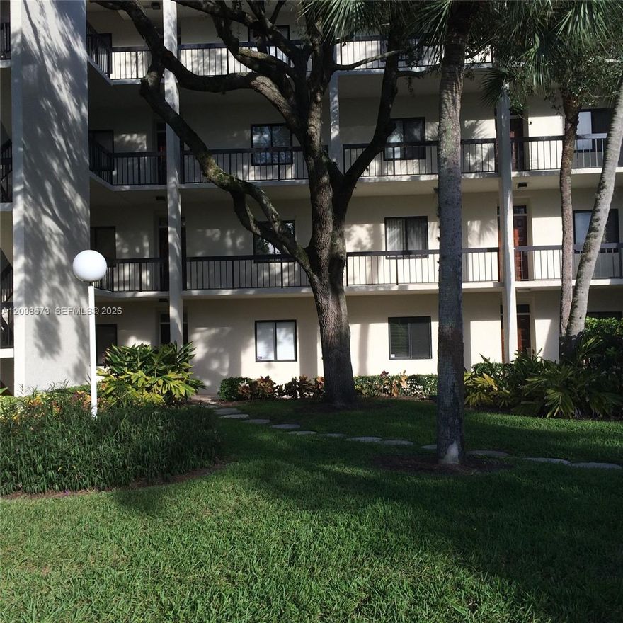 First-floor condo located in a gated golf community with a 24H guard gate. All ages welcome; no mandatory membership for the on-site Banyan Cay Golf Club. This corner unit offers a private and relaxing garden view with an ideal split-bedroom floor plan for privacy. Features include 2 bedrooms, 2 bathrooms, and the convenience of in-unit laundry. Bright and generous entertaining area with a wrap-around balcony. The community offers a pool and clubhouse. Private parking and storage included. Excellent location, steps from the outlets, Downtown, and PBI Airport, and just minutes to the beaches, restaurants, and more. Property will sell fully furnished, Property is rented, please allow 24h for showings.