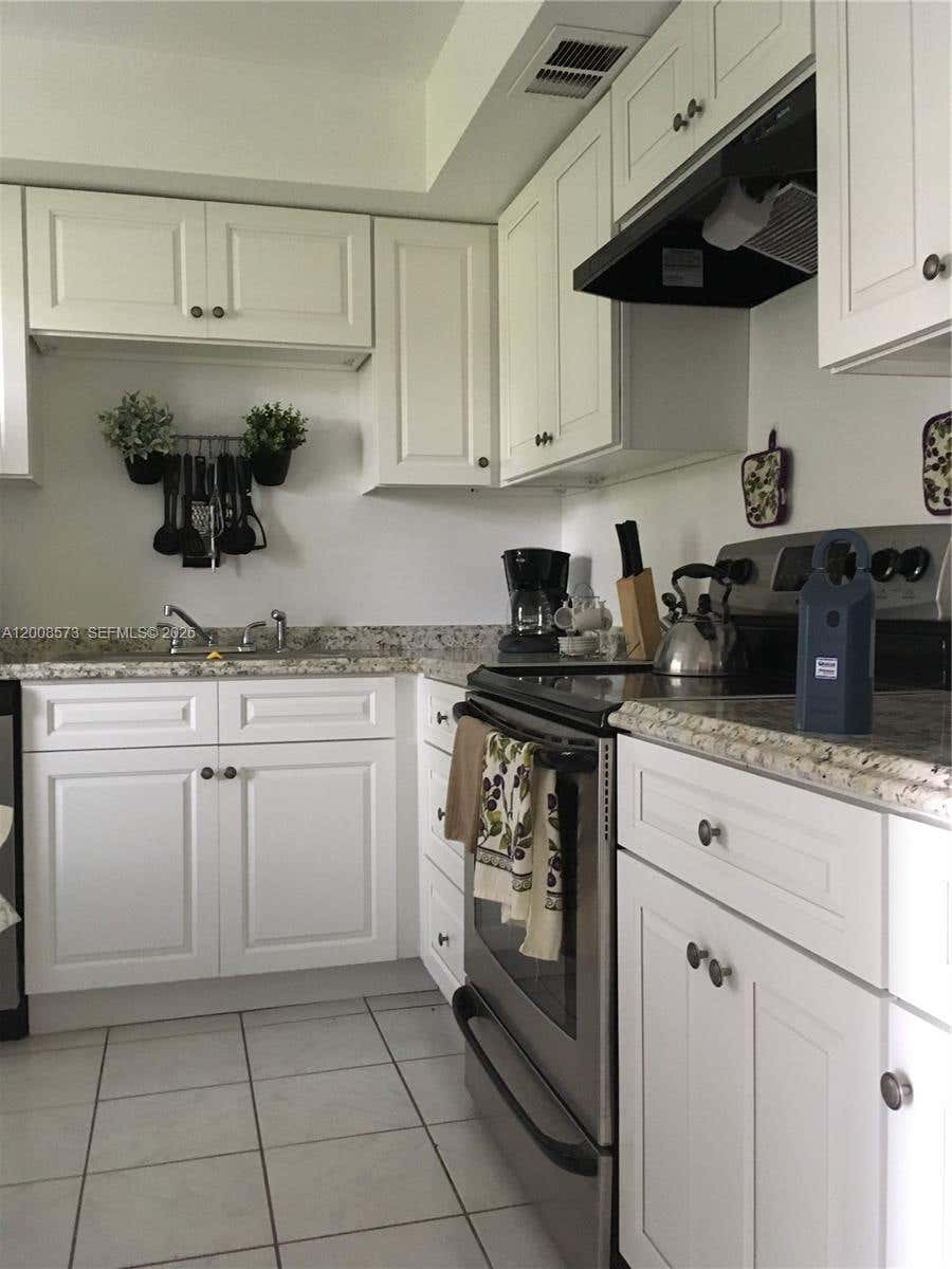 Photo of 3050 Presidential Way #101, West Palm Beach, FL 33401 (MLS # A12008573)