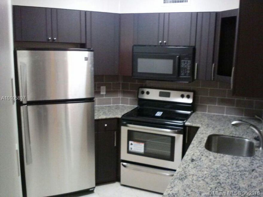 Remodeled 1 bedroom 1 bathroom condo.  3rd floor unit. high ceilings, tiled throughout. black/ stainless steal appliances. large screened balcony, Washer / dryer stack-able in unit. Elevator in the building.  Gated Community w/ security patrol, boasts 2 pools, lake, walking path and a tennis court.