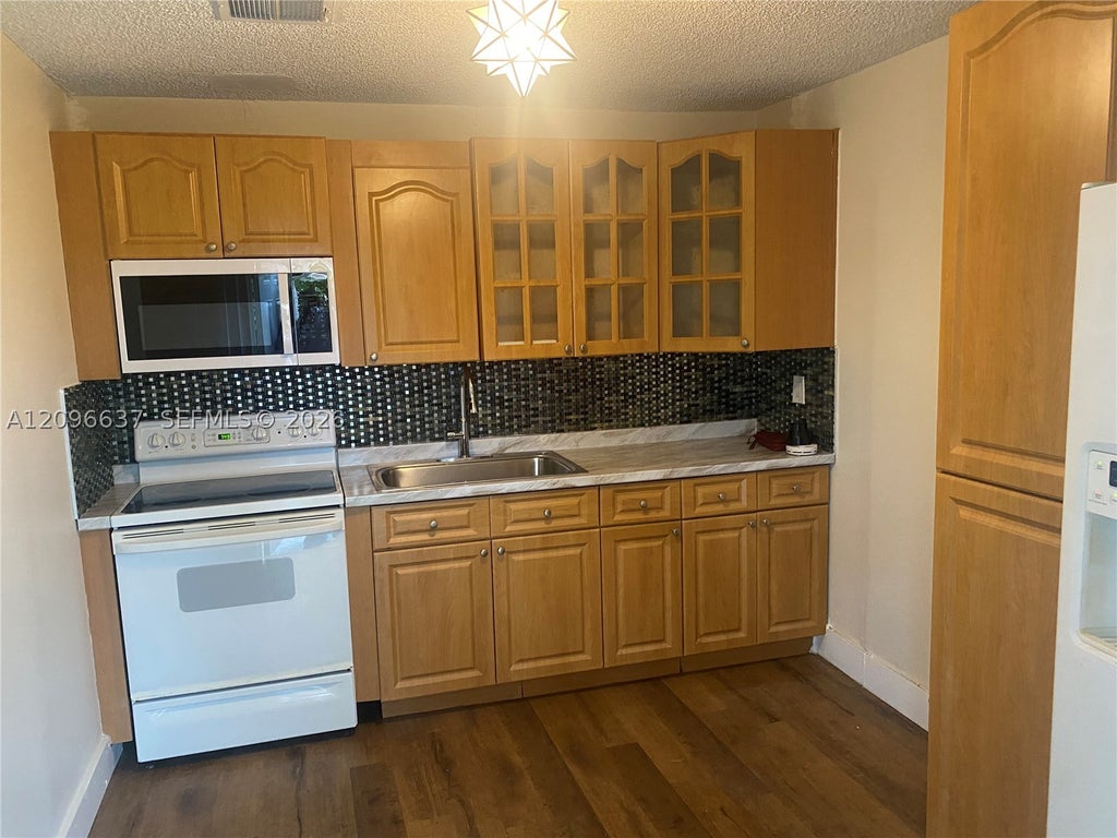 Photo of 8310 NW 47th St #0, Lauderhill, FL 33351 (MLS # A12096637)