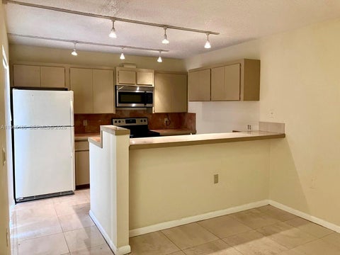 Photo of 2610 26th Way, West Palm Beach, FL 33407 (MLS # A11965185)