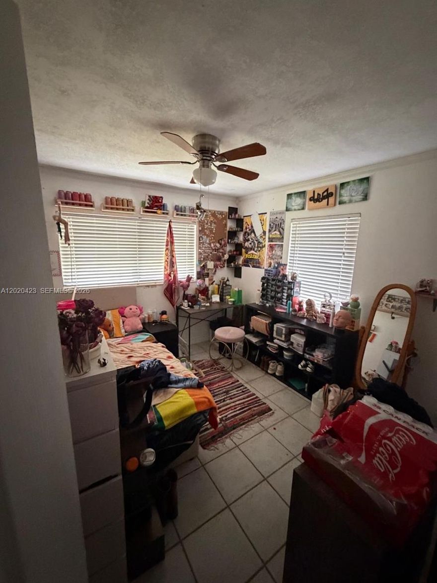 This property is being sold as is, priced to sell, needs work.  No HOA Patio Roof Top, bunker home built before 1954.  Poured concrete Walls and roof.  Call listing agent to schedule your showing