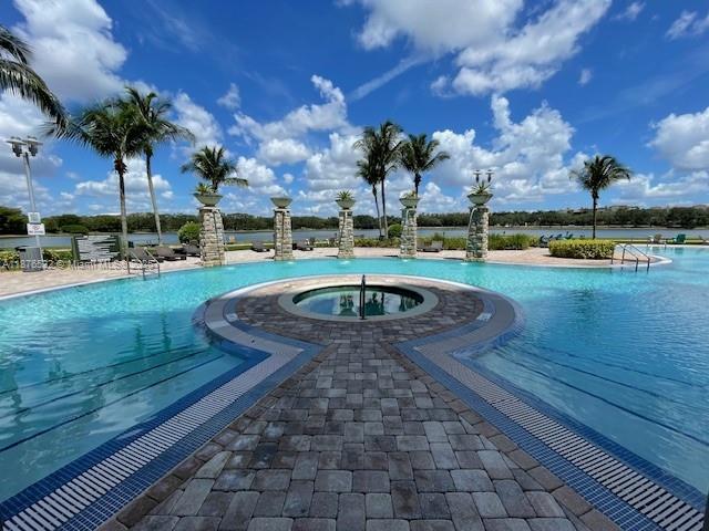 AMAZING 3-BEDROOM 3 BATH CORNER UNIT, with stunning views of the everglades and lake. This condominium offers resort style amenities: 24-hour lobby attendance, gym, pool, tennis court, picnic tables, BBQ, pool table, party room & sauna. two parking spaces. The building is located right across the street from sawgrass mall. Must see. Text or call listing agent.