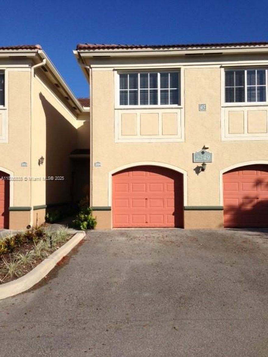 Beautiful lake views from this spacious apartment with a huge balcony and garage. Brand new floors, freshly painted, clean and ready to go. It also includes a full size washer and dryer inside of the apartment. Rent includes water bill. Three bedrooms, two full bathrooms, close to major highways, main avenues, shopping centers.