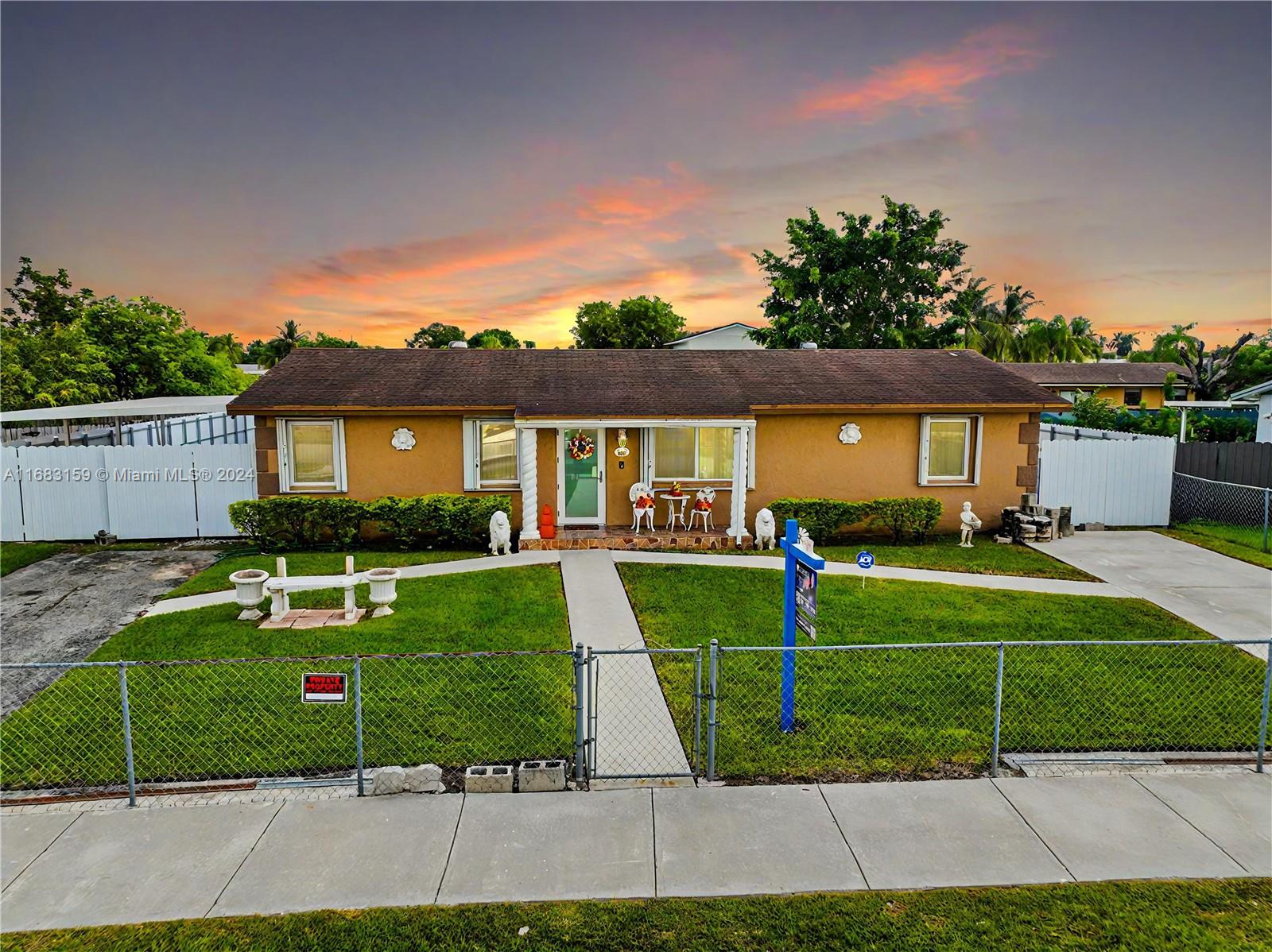 Beautiful single-family home with 3 bedrooms and 2 bathrooms sitting on an oversized 7,957 Sq. ft lot. This property features spacious living and dining areas. The fully functional kitchen has plenty of cabinets for storage, granite countertops, and a dedicated laundry room. The primary bedroom has a full bathroom and a walk-in closet. The beautiful and spacious screened patio with a kitchen is perfect for gatherings. New impact windows. The fully fenced yard has a shed for extra storage and enough room to build a pool and park a boat and RV. Prime location with easy access to Krome ave, US1 and the Florida Turnpike, as well as close proximity to the entrance of captivating Florida Keys. NO HOA!!! Enjoy Immersive 3D Virtual Tour. May the Force be with you!