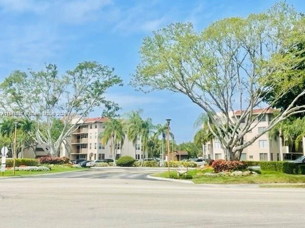 Photo of 1811 Sabal Palm Dr #208, Davie, FL 33324 (MLS # A11847527)