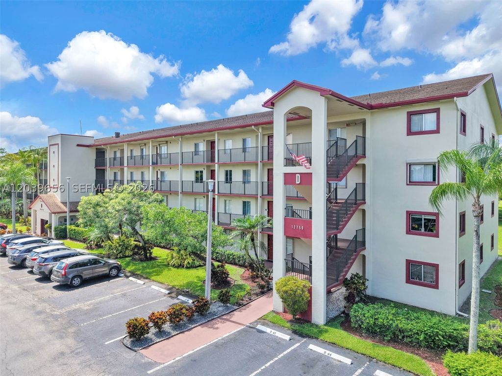 Photo of 12750 SW 15th St #204D, Pembroke Pines, FL 33027 (MLS # A12039656)