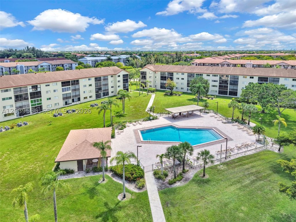 Photo of 12750 SW 15th St #204D, Pembroke Pines, FL 33027 (MLS # A12039656)