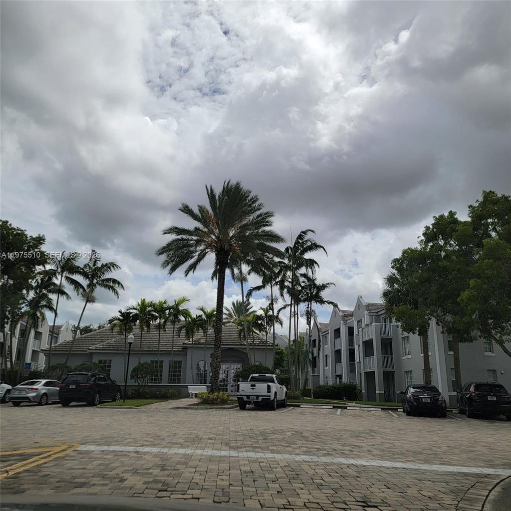 Photo of 711 SW 111th Way #301-7, Pembroke Pines, FL 33025 (MLS # A11975510)