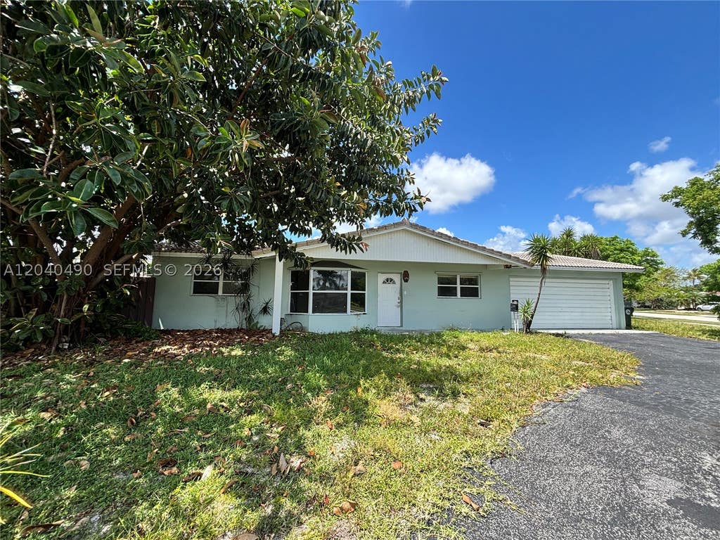 Photo of 4300 NW 9th Ct, Coconut Creek, FL 33066 (MLS # A12040490)