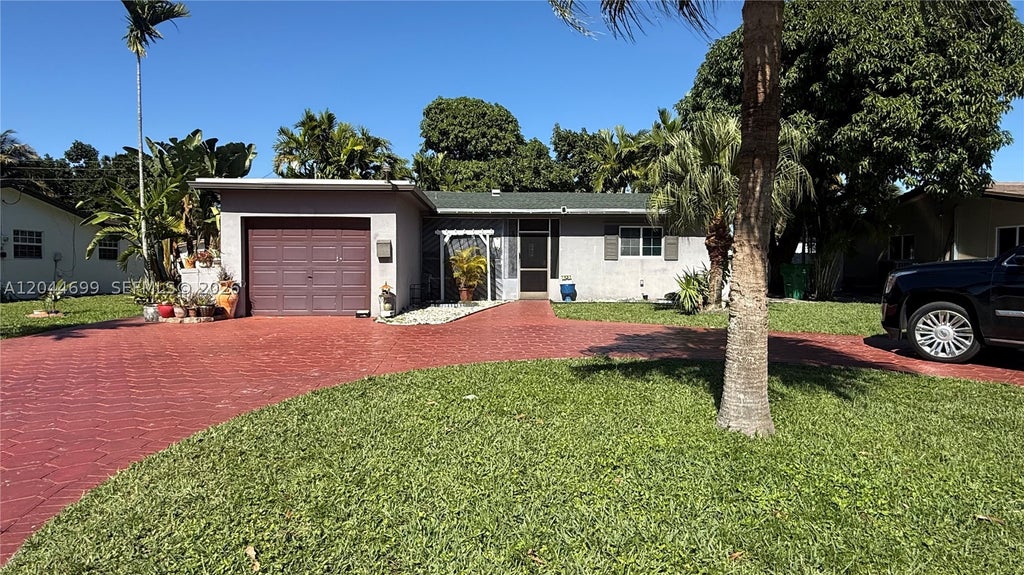 Photo of 7961 Orleans St #1, Miramar, FL 33023 (MLS # A12044699)