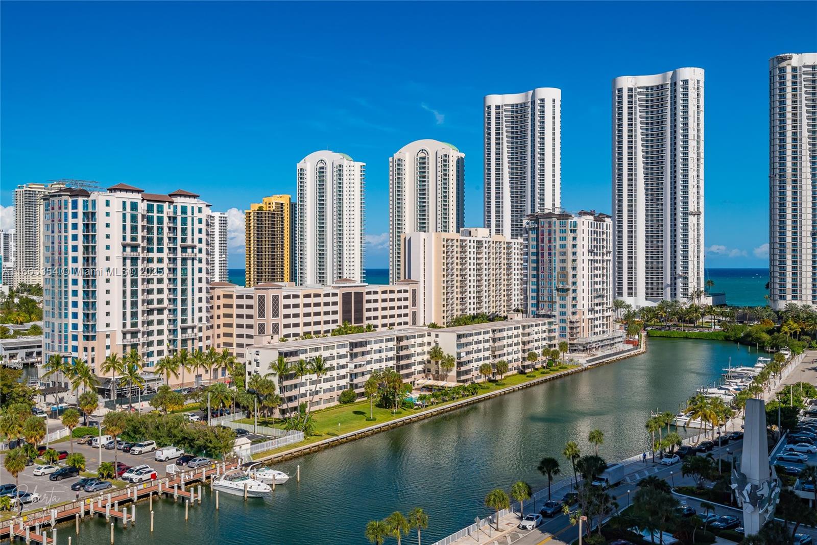 Enjoy your ocean and skyline views from this beautiful and bright 1 Bedroom 1 and 1/2 baths apartment. Walk to the beach and live in one of the most desirable cities with A-rated school. Bathrooms and kitchen are renovated. The Arlen House is a private gated community with boat docks and 5-stars amenities. Luxurious lobby with doorman, fitness center, restaurant, beauty salon, mini market, card room, large party/event room, library, basketball and tennis courts