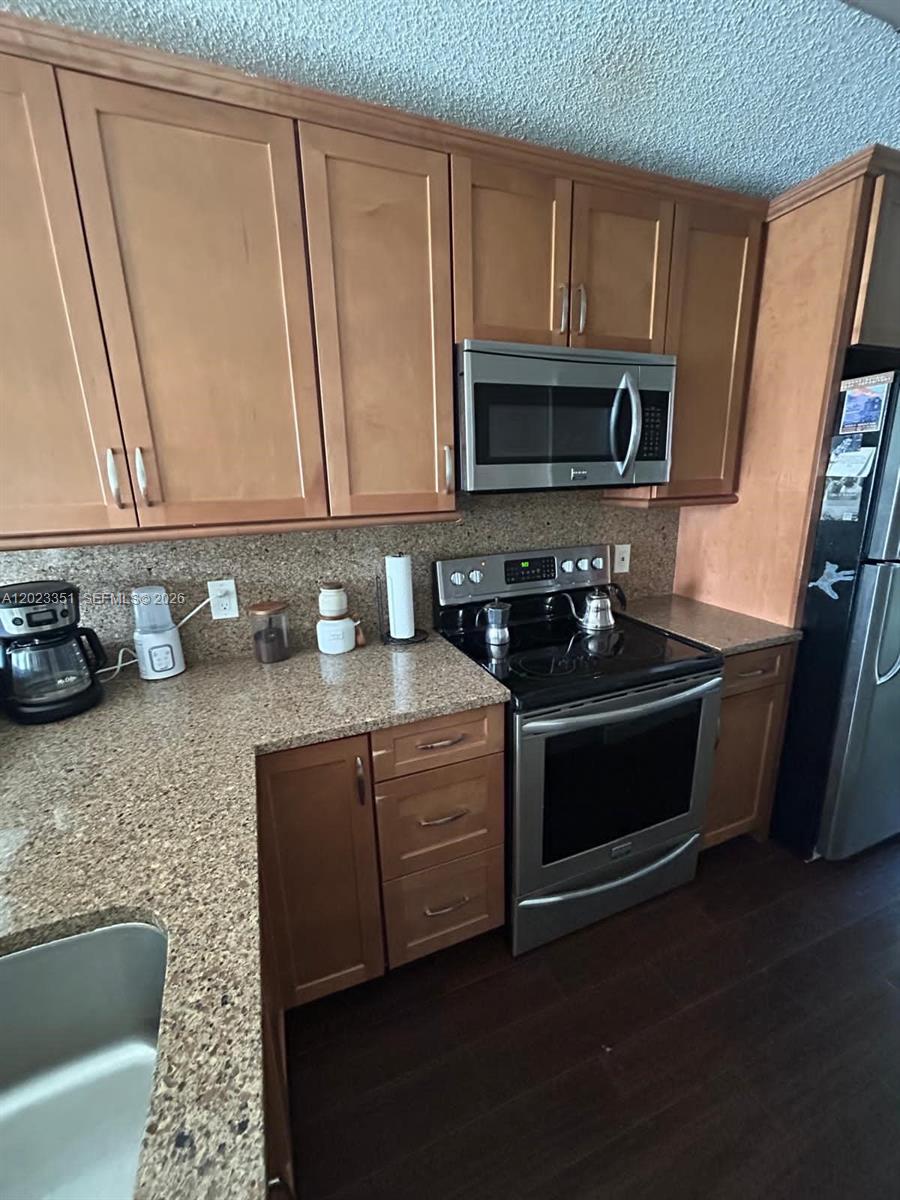 NAPOLI GARDENS AT CORAL S - Residential