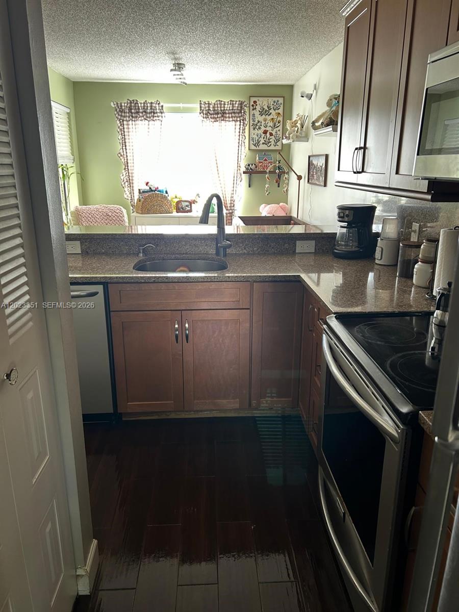 NAPOLI GARDENS AT CORAL S - Residential