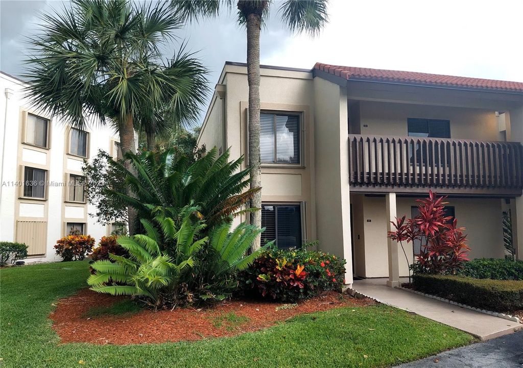 Photo of 5400 Cedar Lake Dr #201, Boynton Beach, FL 33437 (MLS # A11401636)