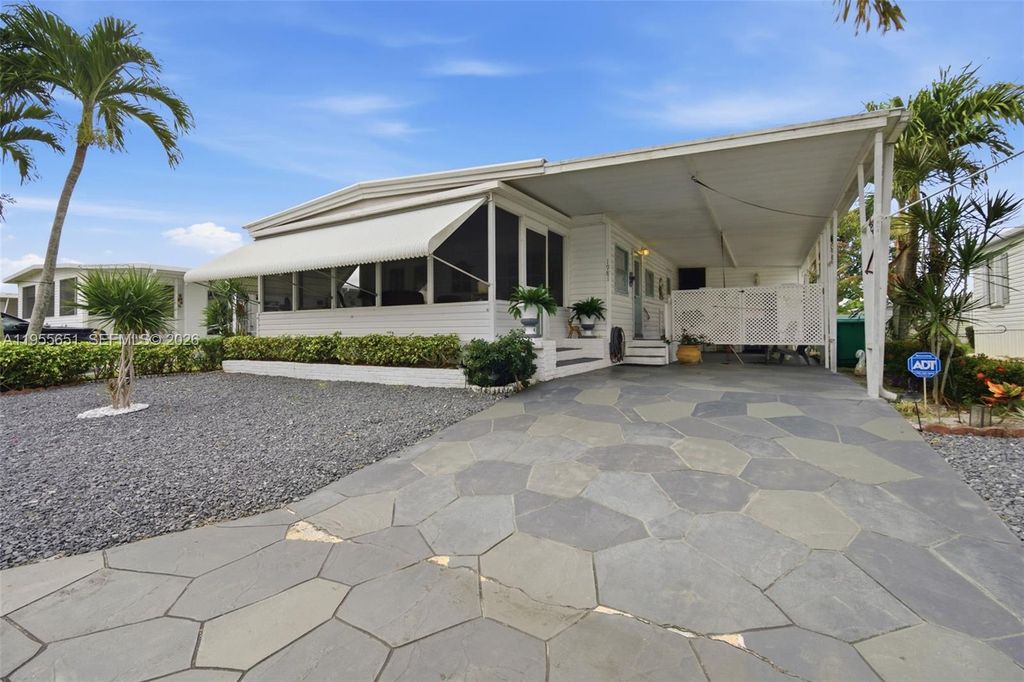 Photo of 1981 SW 83rd Ave, Davie, FL 33324 (MLS # A11955651)