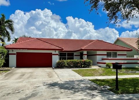 Photo of 1101 NW 162nd Ave, Pembroke Pines, FL 33028 (MLS # A11878210)