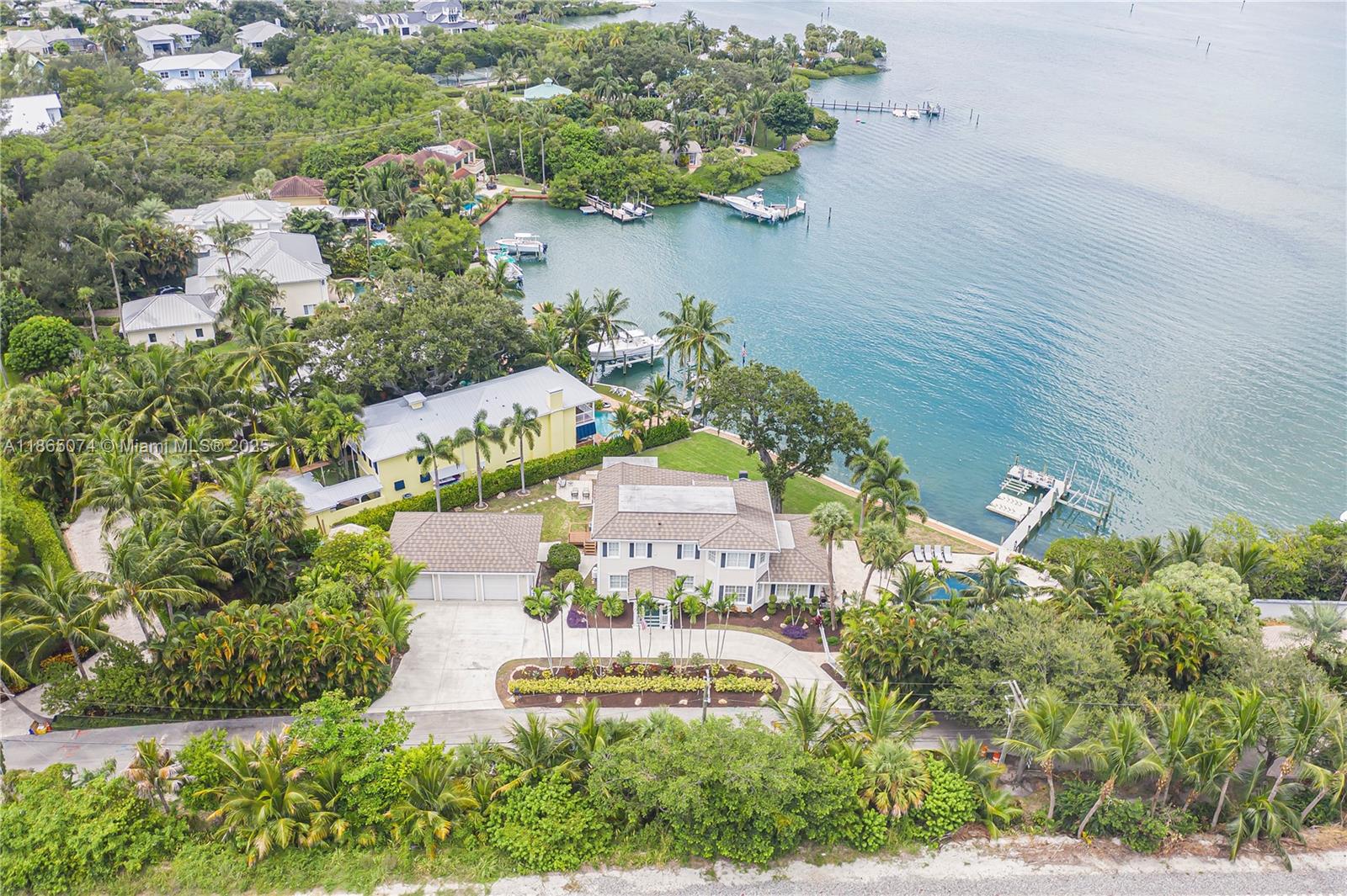 STEP BACK IN TIME WITH THIS BEAUTIFUL RESTORED RESIDENCE. COMPLETELY RENOVATED AND BROUGHT UP TO TODAYS STANDARDS. SITTING ON ( .50 AC ) THE PRISTINE BLUE WATERS OF THE LOXAHATCHEE RIVER ( 141 FEET ) WITH ITS BREATHTAKING VIEWS AND VISTAS. THIS HISTORIC BLEND AND MODERN LUXURY IS A PERFECT EXAMPLE OF ELEGANCE AND TIMELESS CHARM , WHICH MAKES THIS PROPERTY ( .50 AC. ) VERY UNIQUE. LANDS END IS WITHOUT QUESTION THE MOST DESIREABLE WATERFRONT ( BAHAMA BLUE ) ENCLAVE IN PALM BEACH COUNTY. NEW POOL ( 2024 ) WITH GUNITE / PEBBLE TECH / 10 PERSON HOT TUB AND A BAHA SHELF. OVER SIZED THREE CAR GARAGE WITH LIFT . JUPITER INLET IS A LEISURELY BOAT RIDE WITH CHARMING WATERFRONT RESTURANTS AS WELL. CALL LISTING BROKER, DANIEL TAYLOR FOR ALL SHOWINGS AND ADDITIONAL INFORMATION.