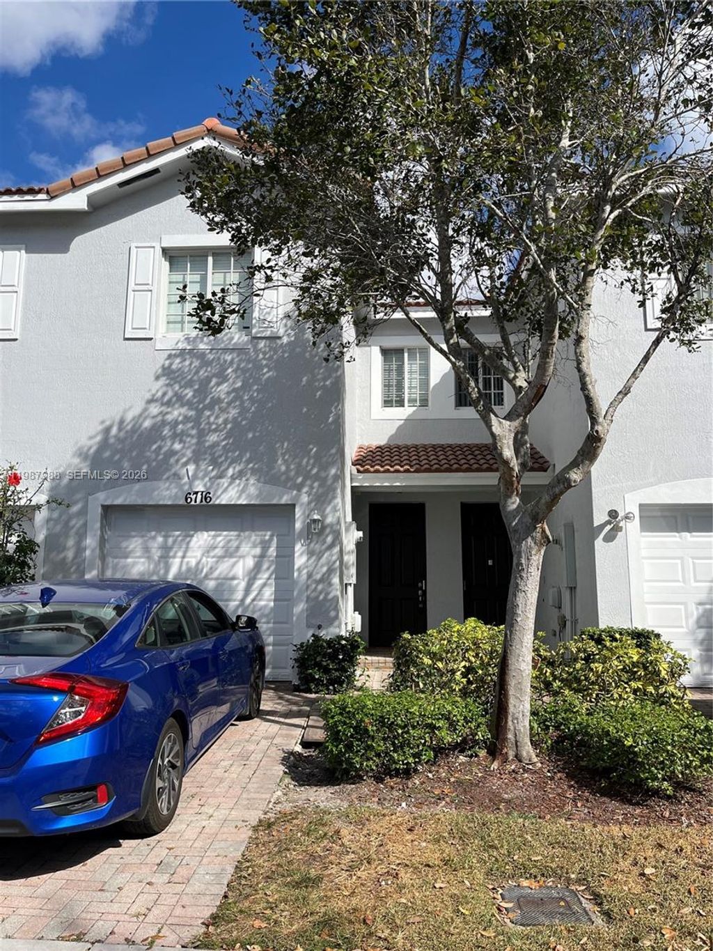 Photo of 6716 Cypress Walk Ter #6716, Tamarac, FL 33321 (MLS # A11987988)