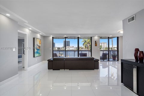 Photo of 200 Golden Isles Dr #206, Hallandale Beach, FL 33009 (MLS # A12078035)