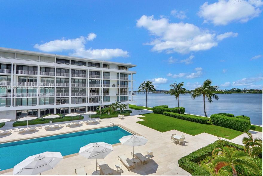 Beautiful 2 Bedroom/2 Bathroom condo with direct south/west facing water views! Perfectly located across the street from the Four Seasons with gorgeous sunset views.  There is also a path to the beach with chairs set up daily on the water.  There is a brand new gym, grill and pool, arguably the best on Palm Beach island!  The second bedroom wall has been opened but there is a sliding door which can close it off for privacy.  The lobby's and party room have recently been renovated and there is 24/7 doorman service.
