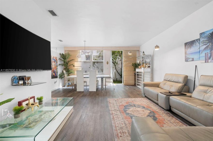 Welcome home to this 2 story corner home located in L'Etoile at Emerald Pointe in Hollywood! Featuring 3 bedrooms, 3 full bathrooms, and a 1-car garage, and space to park 2 cars in the driveway. It has a Brand NEW ROOF, and Impact windows! The first floor offers a bedroom and full bath, while the main living areas boast an open layout with new flooring, providing plenty of space for relaxation and dining. Upstairs, the expansive master suite is a true retreat with a beautifully remodeled en suite bathroom. LOW HOA includes cable, internet, landscaping, a heated pool, gym, and playground. Ideally located near the Hard Rock Casino, shopping, restaurants, TY Park, and with easy access to I95.