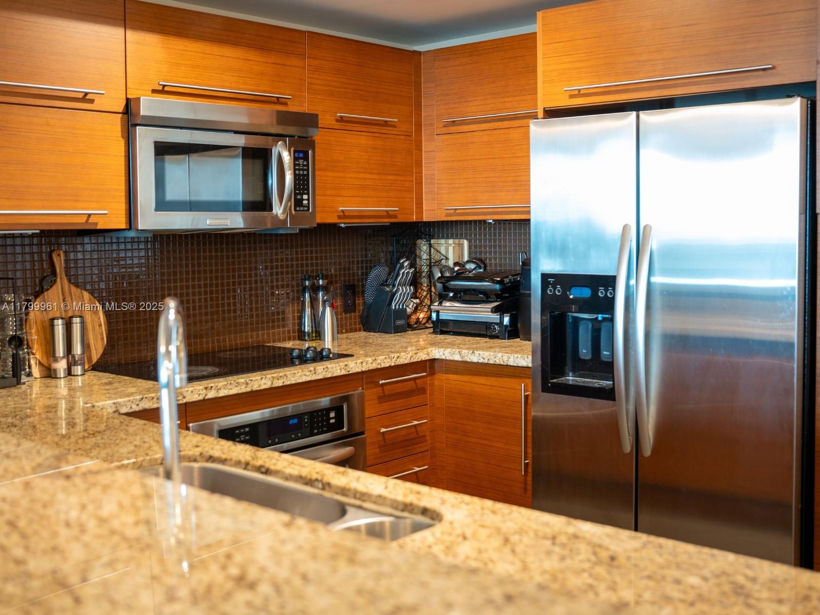 TAO SAWGRASS CONDOMINIUM - Residential