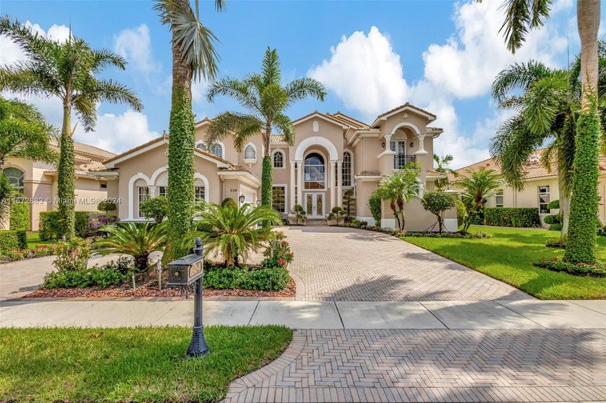 Welcome to this spectacular, luxurious home situated in the exclusive Hermitage Custom enclave of Frenchmans Reserve.Nestled on one of the best lots, you’ll enjoy breathtaking views of the lake and golf course. The Villa Rosa is a Mediterranean-designed estate home with natural light and towering ceilings.5 BRs 6 BAs, private office, and a formal living room with built-in wet bar. Separate 1st Floor primary suite features 2 ample closets, an exercise area, 2 BAs. Add'l 1st floor guest ensuite. Loft space with 3 ensuite BRs upstairs, including a 2nd primary with balcony and view. Elegantly appointed with the finest upgrades and decor, this home is available fully furnished. Impact glass, full house generator. Just minutes from the Gardens Mall , restaurants, entertainment and beaches.