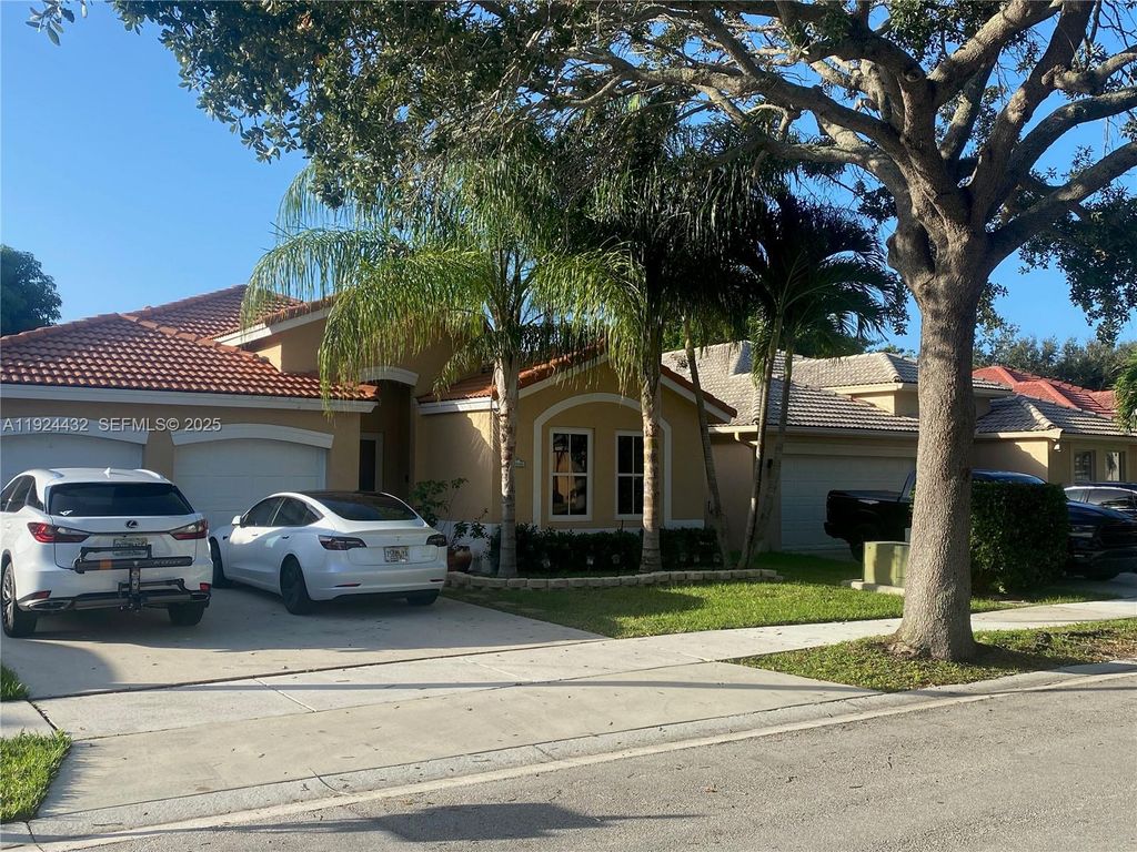 Photo of 14046 S Cypress Cove Cir, Davie, FL 33325 (MLS # A11924432)