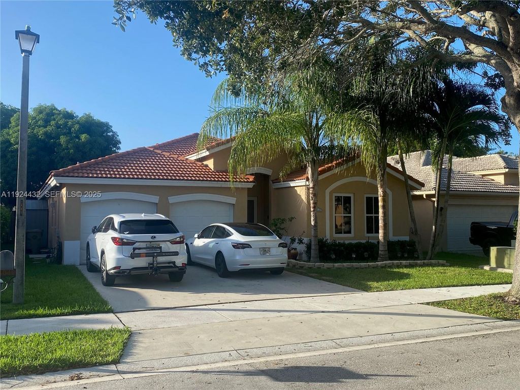 Photo of 14046 S Cypress Cove Cir, Davie, FL 33325 (MLS # A11924432)