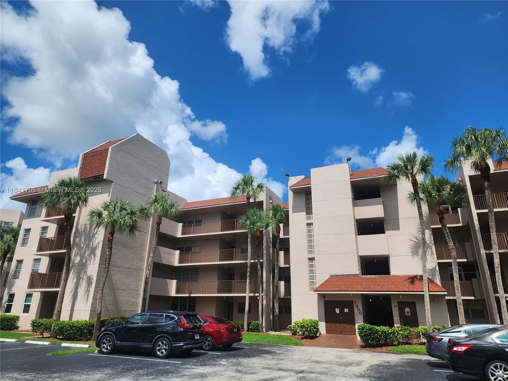 Photo of 1900 Sabal Palm Dr #305, Davie, FL 33324 (MLS # A11841705)