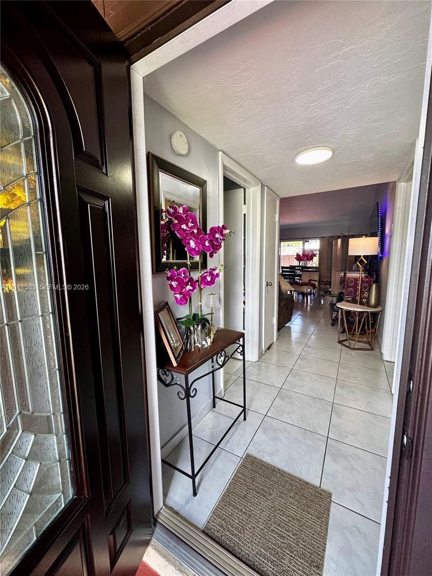 This charming & well maintained corner unit at Devon-Aire features a beautiful wood & glass entrance door that creates an inviting & warm atmosphere.  The original kitchen is ready for your personal touches. Generously sized primary, plus 2 additional bedrooms. An inviting fenced patio: perfect for small gatherings/afternoon tea. Both bathrooms have been retouched. Community Lake access to connect with nature. Ideally located just steps away from coffee shops, restaurants, Publix, Walgreens, banks, and medical facilities & a short walking distance from highly rated elementary & middle
schools. Less than one mile from the Florida Turnpike & 3.8 miles from Mia Killian (Magnet). Whether you are looking for a primary residence or a wise investment, 12316 is an exceptional opportunity!